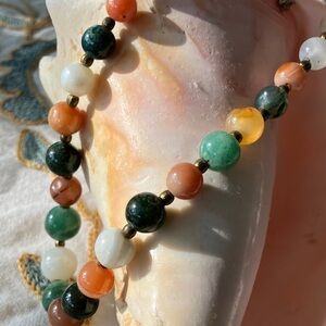 AGATE BEADED NECKLACE WITH BRASS BARREL CLASP AND BRASS SPACERS